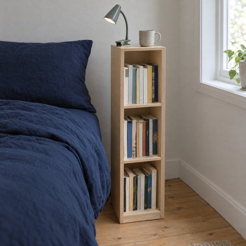 Book Tower beside a bed