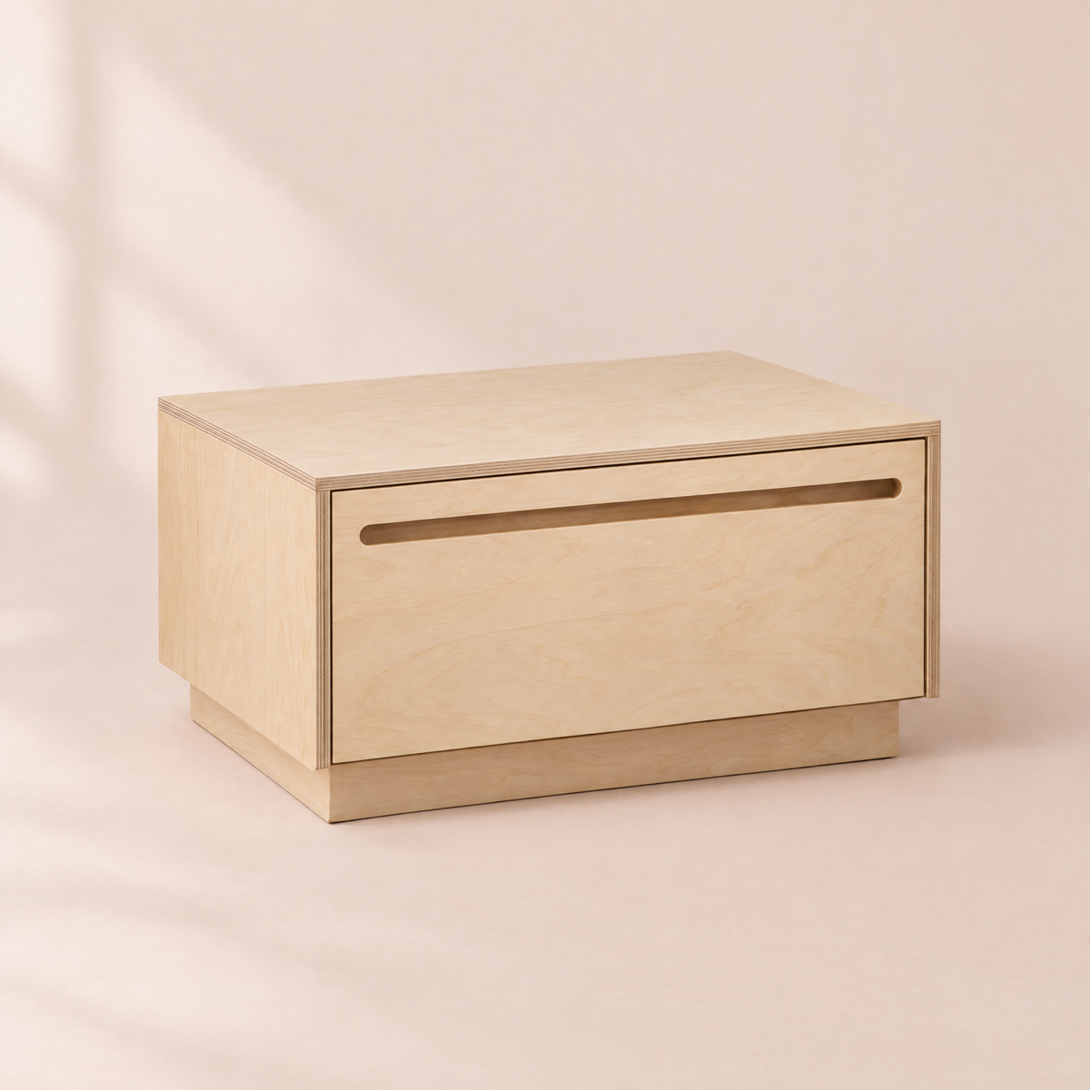 Low Bedside Table in birch plywood, studio photograph
