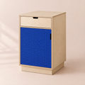 Perforated Door Cabinet in birch plywood, studio photograph