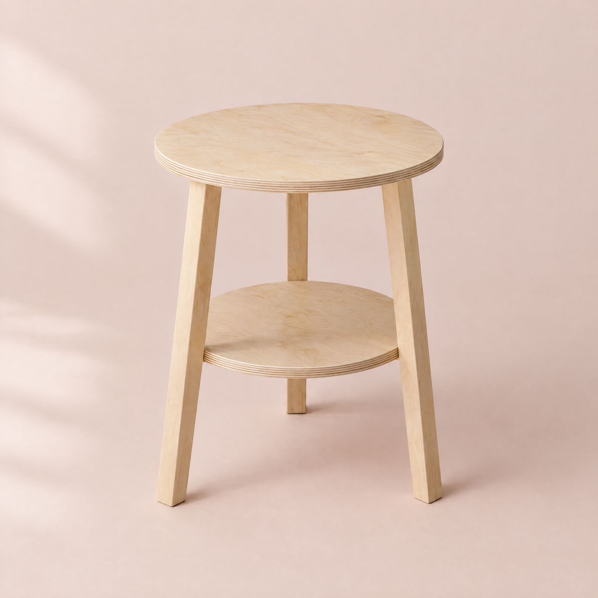 Round Stool Table in birch plywood, studio photograph