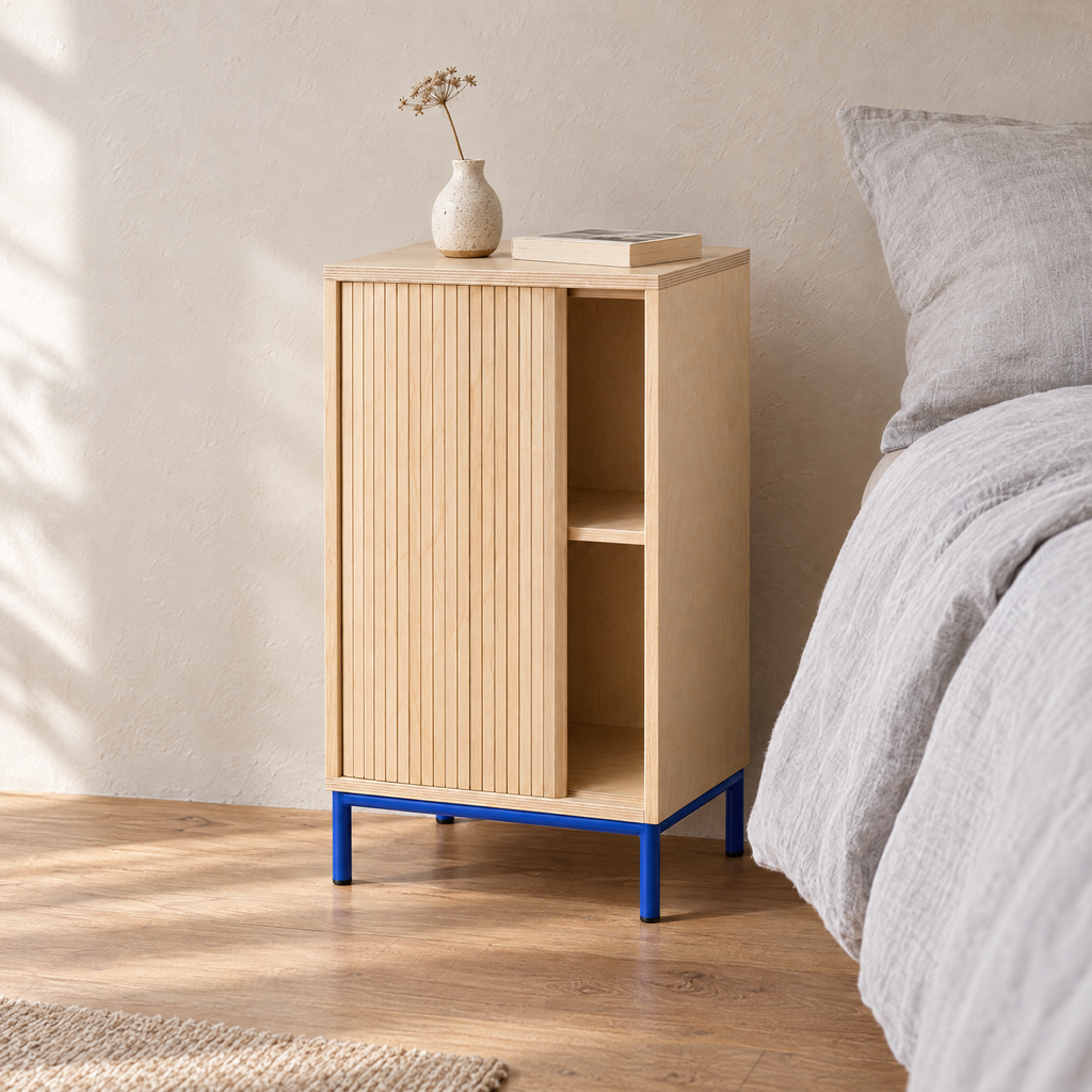 Tambour Cabinet beside a bed